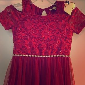 Girl’s red dress